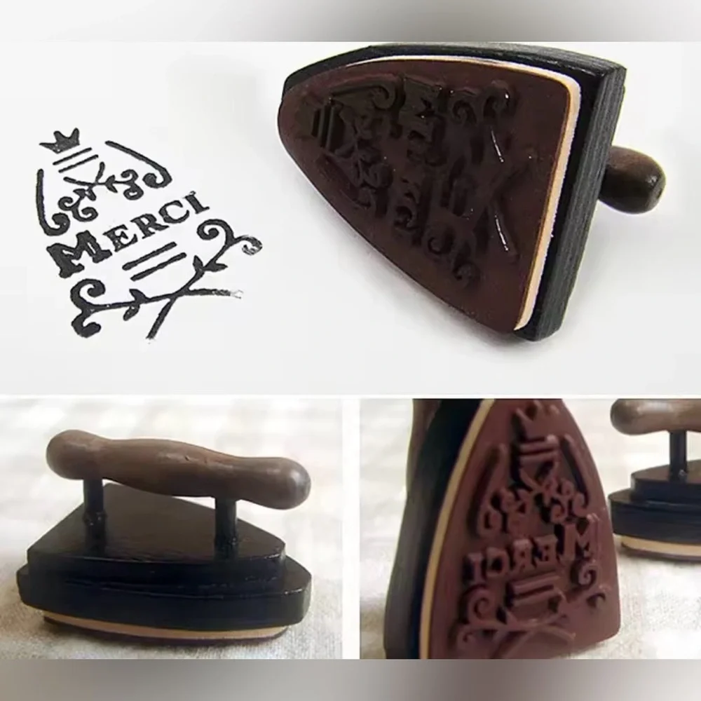$1 FRENCH MERCI STAMP. IRON SHAPED. NEW $1 WITH ANY $10 ORDER OR MORE